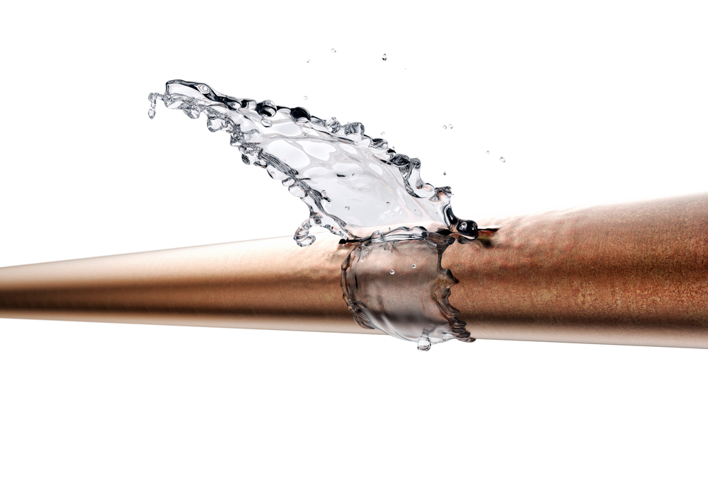 Over flawing water in damaged pipe.